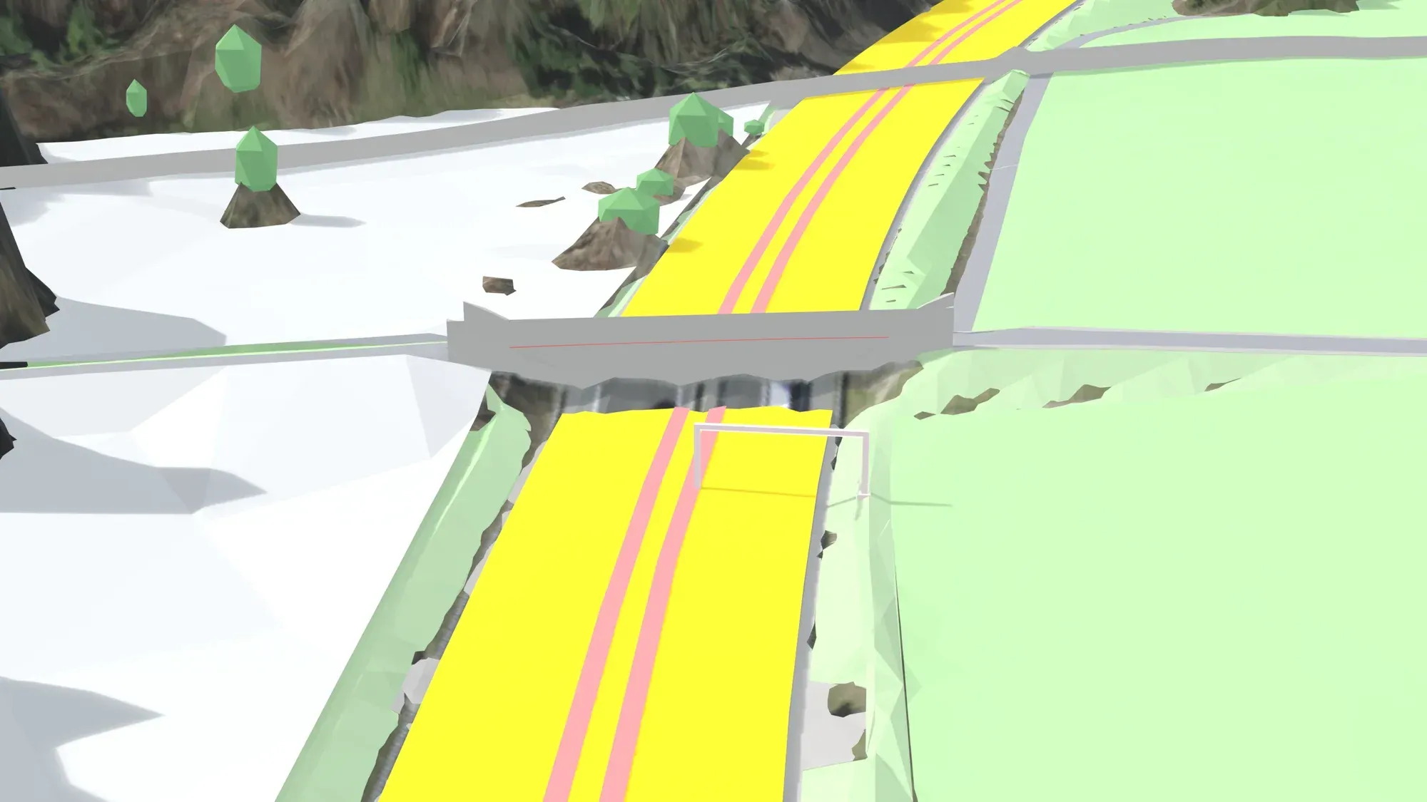 Nahsicht auf eine Überführung über die Autobahn: Die gelbe Fahrbahn zieht von oben rechts nach unten links durch das Bild. Am Kreuzungspunkt reicht eine graue Mauerfläche von der Überführung hinunter bis auf die Fahrbahn und legt sich über sie.
